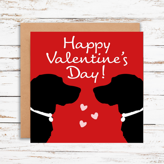 Valentine's Day card with dog silhouettes and 'Happy Valentine's Day!' text on a red background.