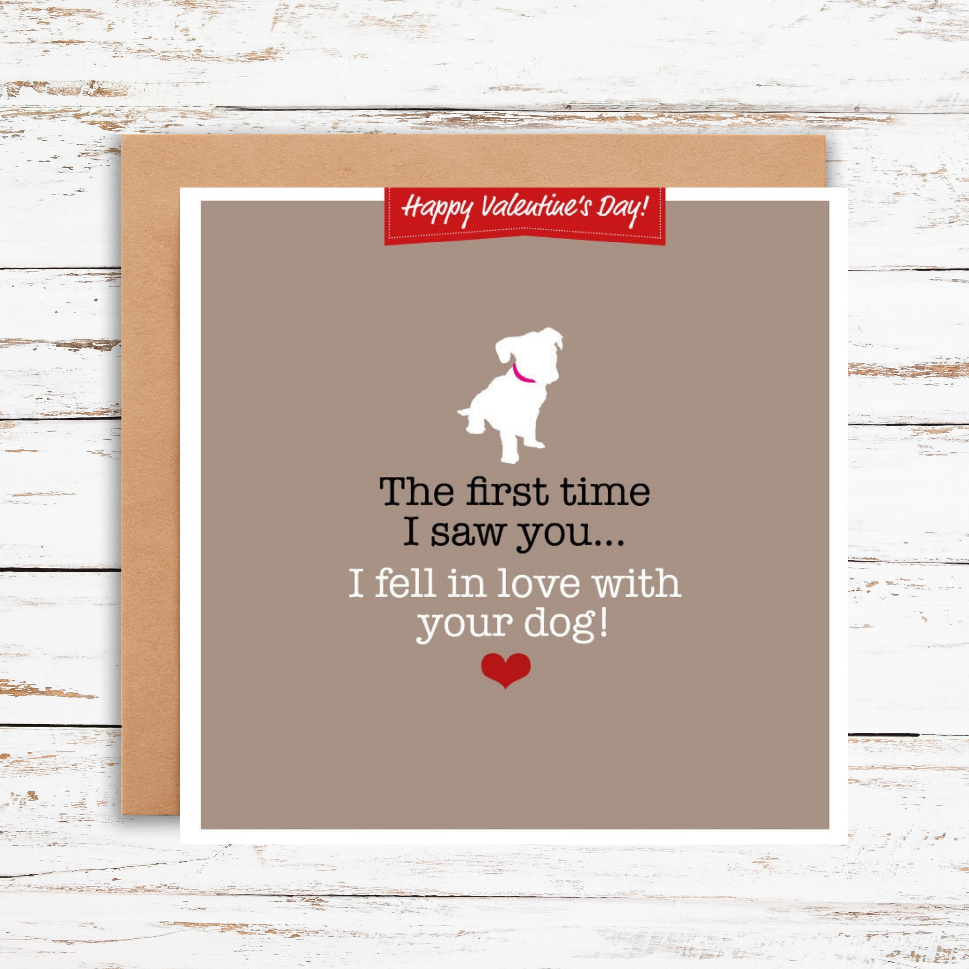 Valentine's Day card with a dog illustration and text on a wooden surface