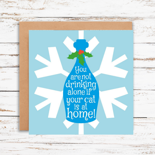 Card with blue bottle and snowflake design on a light blue background, featuring humorous text.