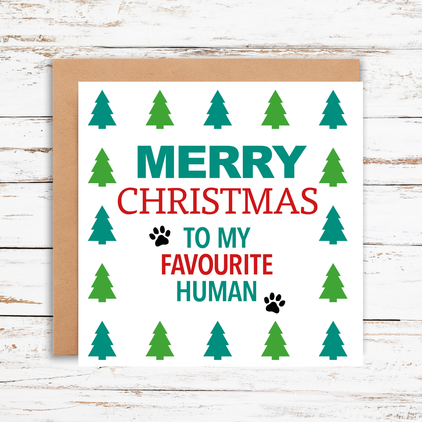 Christmas card with green trees and text on a white background