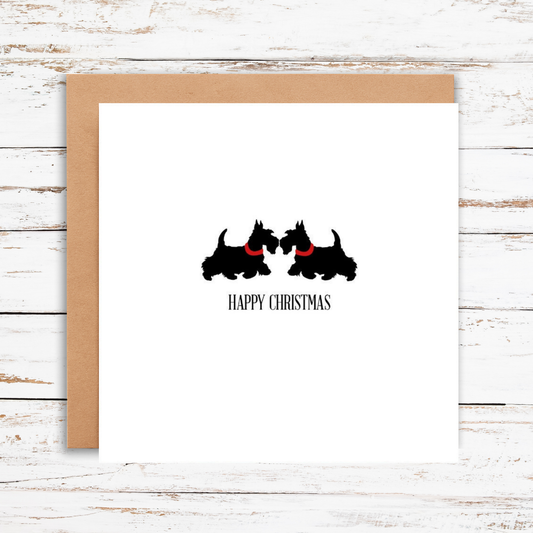Christmas card with two black dogs and 'Happy Christmas' text on a white background