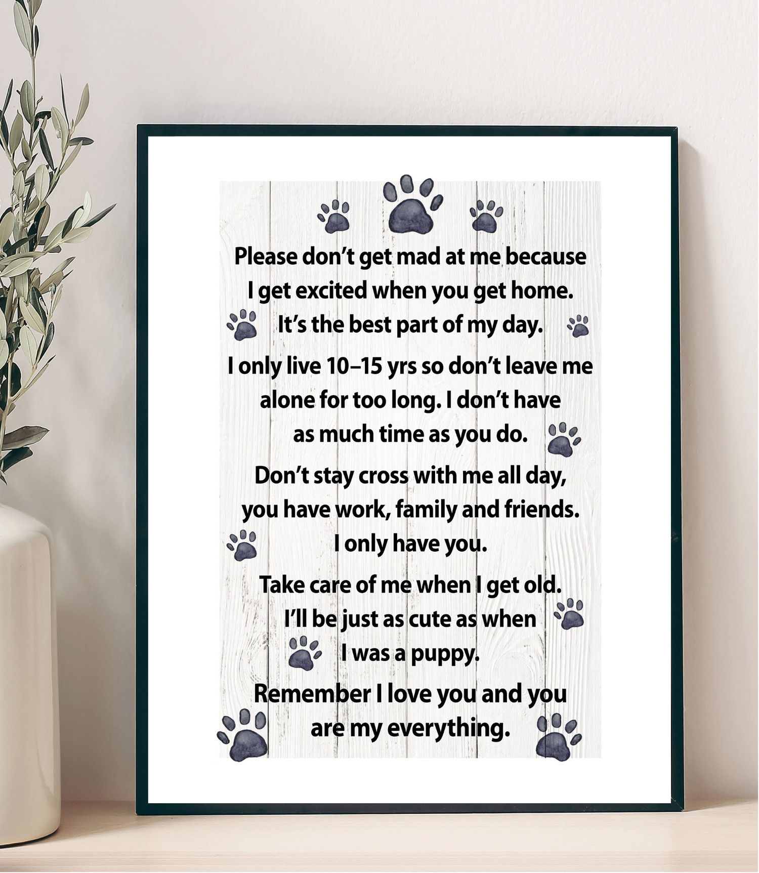 Framed poster with a message for pets on a white background